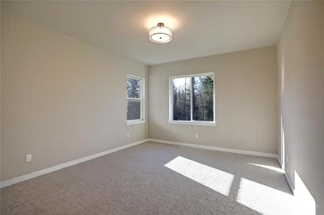 Third bedroom, with double windows for plenty of light.