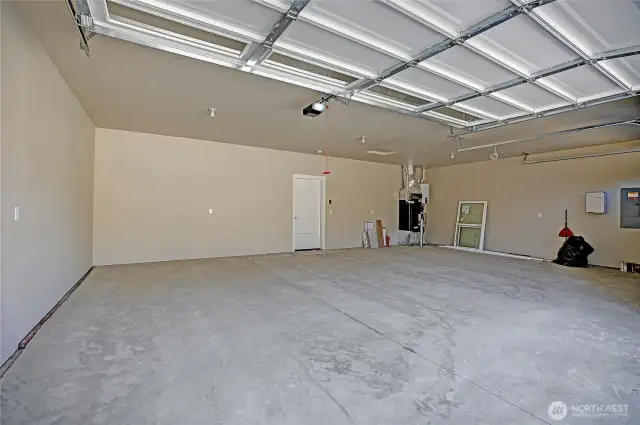 Garage is finished and painted.  Furnace and tankless water heater located in the garage.  Home also equiped with heat pump and solar panels.