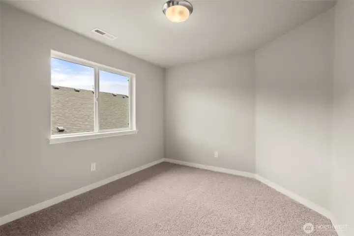 Fourth bedroom with 8' ceiling with a standard reach-in closet and prewired for internet.