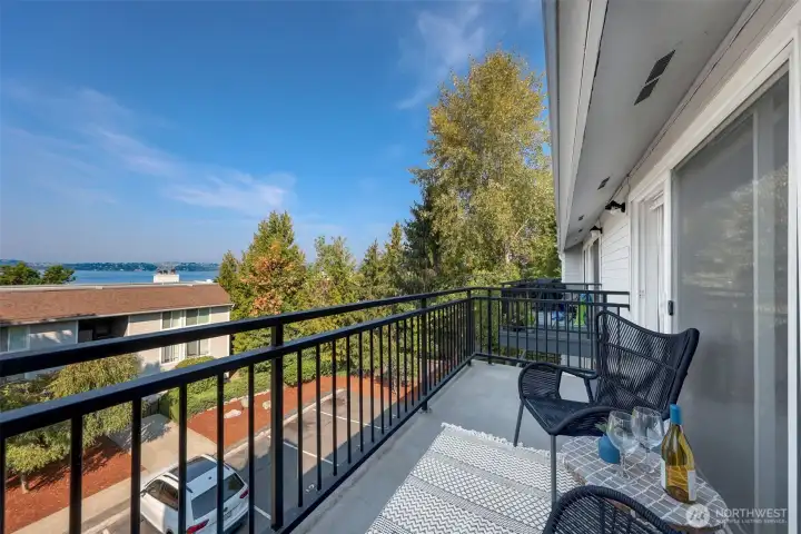 Large view balcony! Almost the length of the entire unit! Modern, wrought iron railings. BBQs ok.
