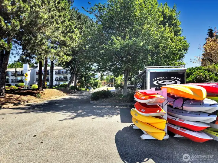 Seasonal paddle board rentals across the street from Sunset Pointe.