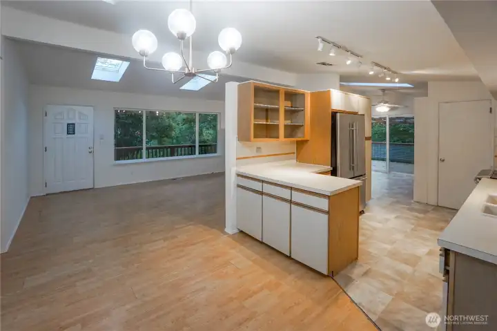 Living Room Flows to Dining Area, Kitchen and Family Room