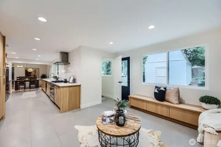 Laundry, half bath and access to the backyard just right of center