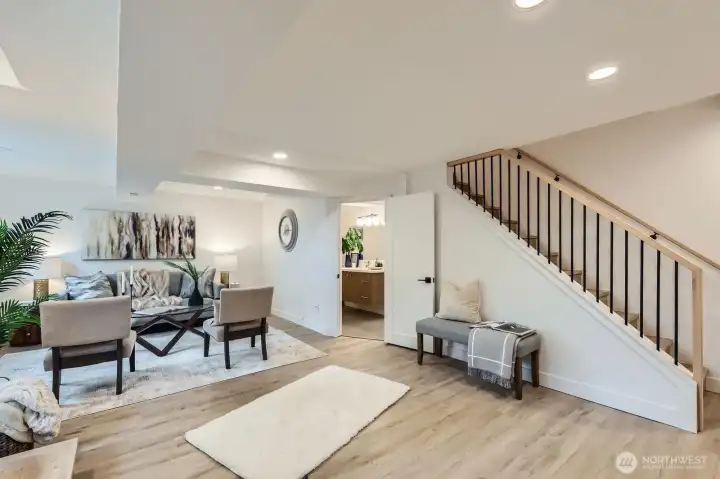 Custom stairway carries into the lower level