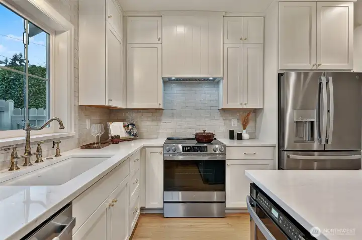 Induction range and a smart layout makes this kitchen a chef's delight.