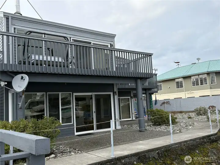 This back patio is perfect for barbeques  and lazy days watching the world go by!