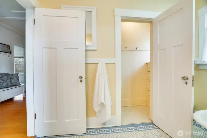 With added drawers and shelving in the walk-in linen closet, this bathroom easily has enough space to meet all your storage needs.