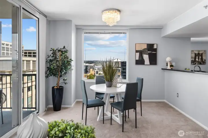 Elegant dining space with city light views in Bellevue Pacific Tower