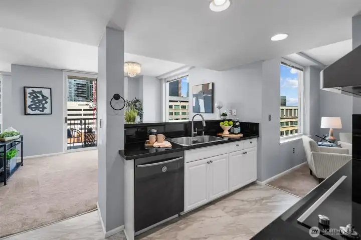 Gourmet kitchen with ample cabinetry in downtown Bellevue condo