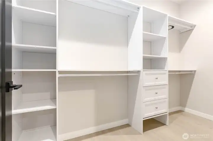 Primary suite walk-in closet.