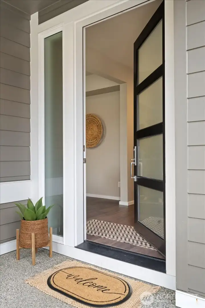 Clean lines and natural light define the entry to this Northwest Contemporary sanctuary.