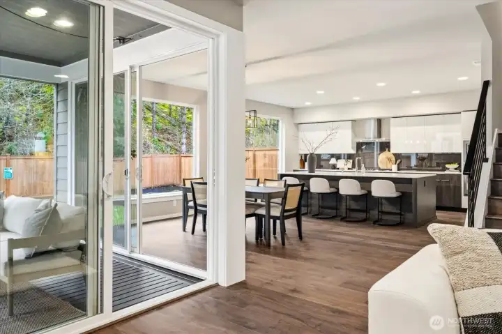 Seamless indoor outdoor connection extends the living space, with a designated dining area and open kitchen designed for both everyday living and easy entertaining.