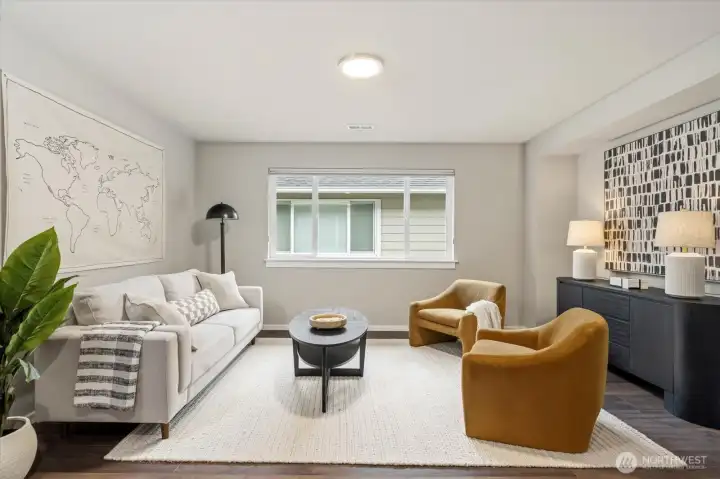 The Loft: Flexible upper-level space for media, play, or work.