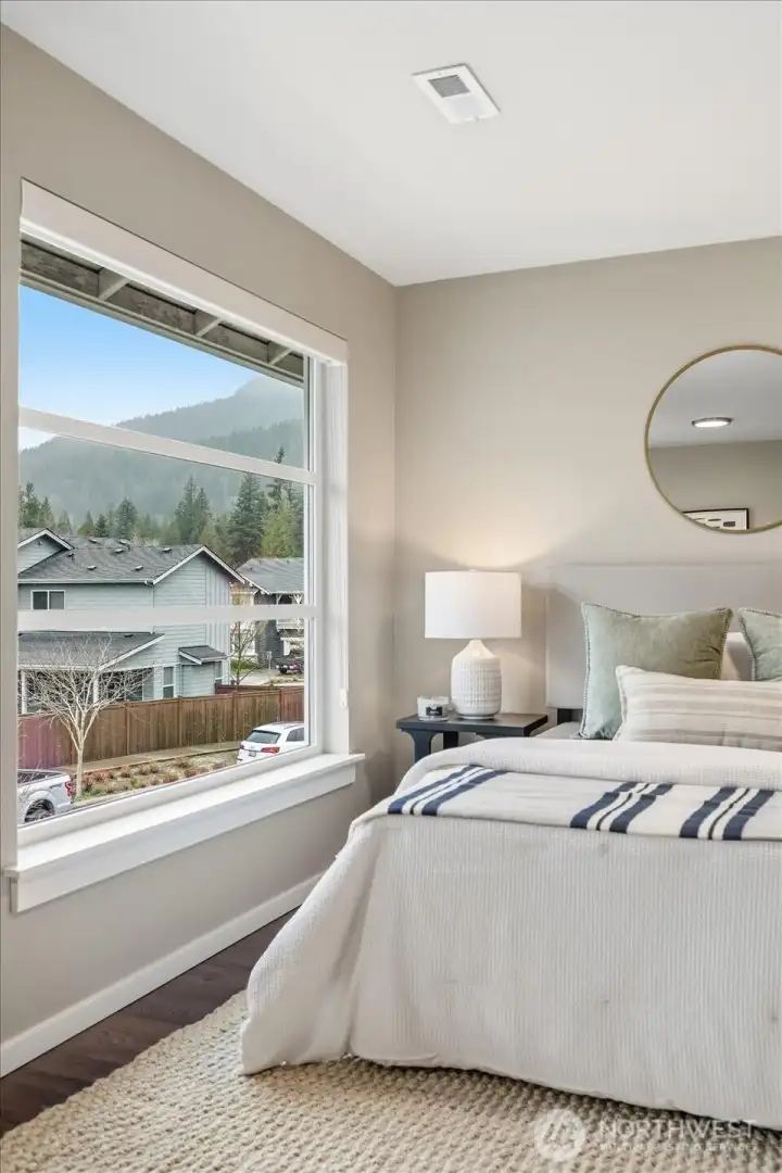 The Mountain Vistas: Expansive windows capture sweeping Cascade views throughout.