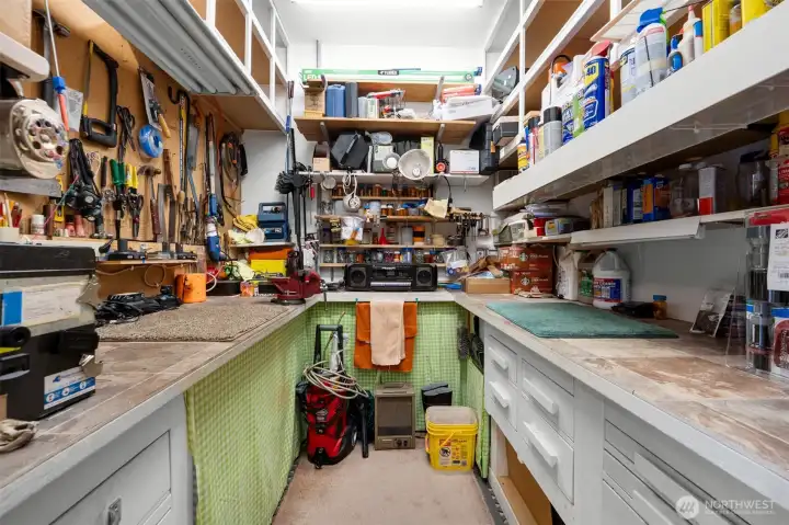 Handy work space to contain all tools just off the garage