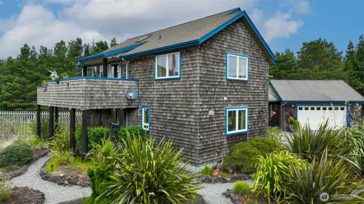 Side of the home showing walking paths