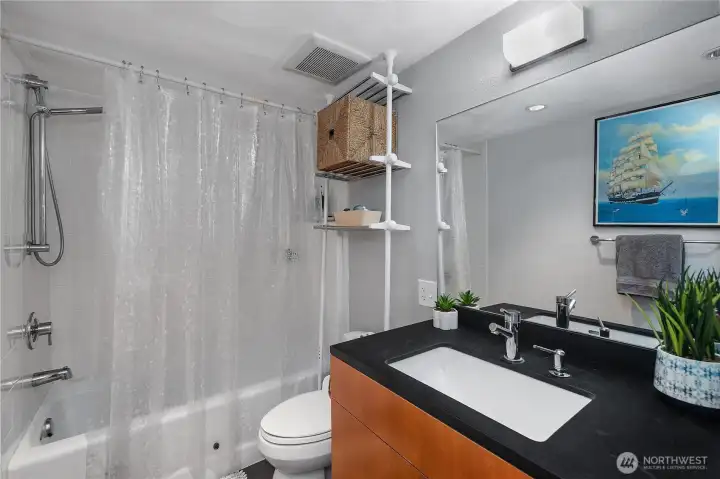 Full bath in the downstairs studio.