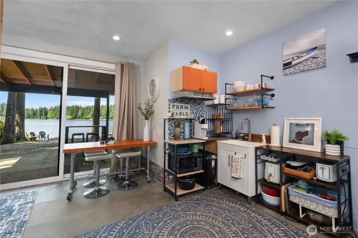 Studio apartment kitchen and dining space - short term rental possibility or host guests in this separate living space.