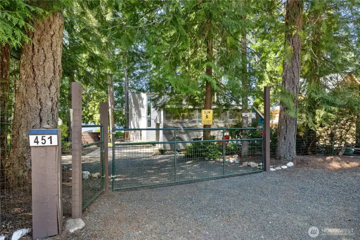 Gated entrance to the home with a gate you can walk thru too.