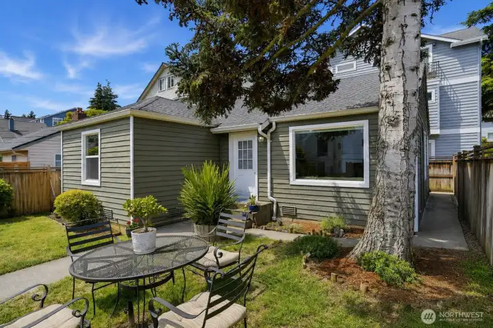 Nice front yard for entertaining or gardening.