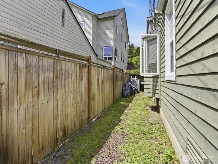 Side yard ideal for extra bike storage and yard tools.