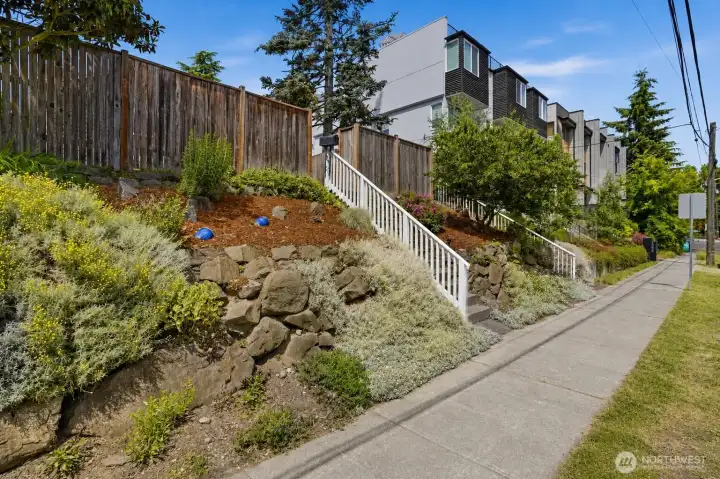 Terraced rock wall and gardens.