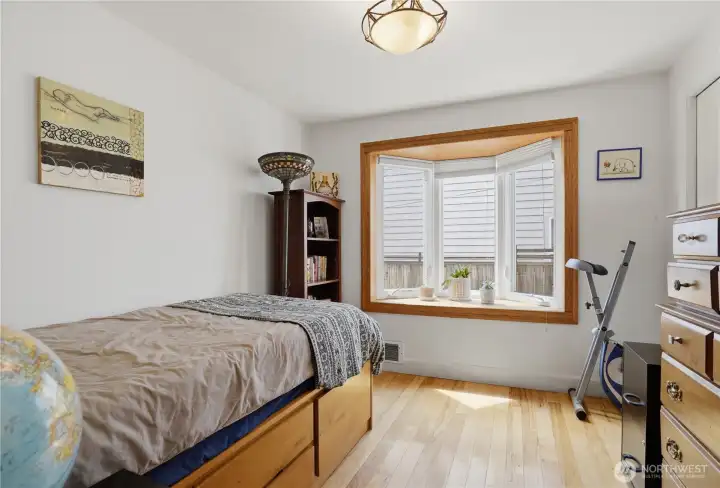 Second bedroom with lovely bay window.