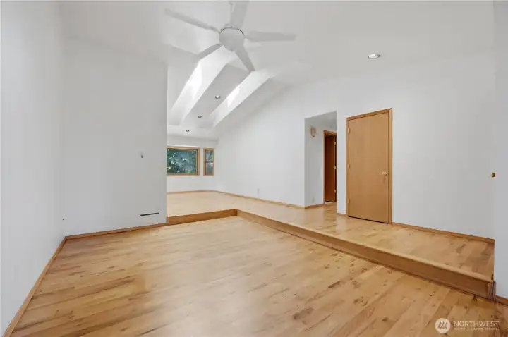Living room with dining room in the background