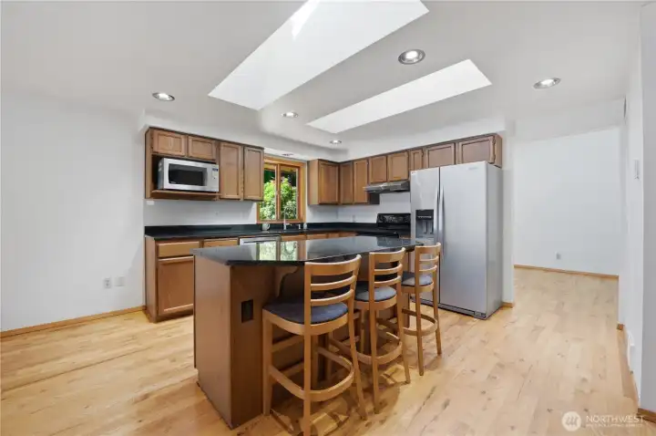 Kitchen area with breakfast bar