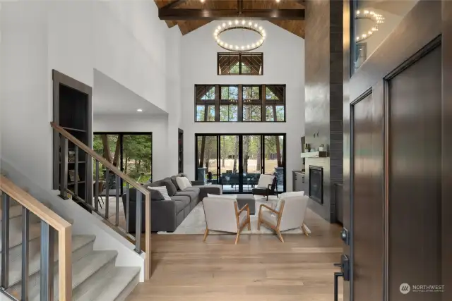 Welcome home! soaring ceilings & oversized sliding doors give home an open but cozy feeling