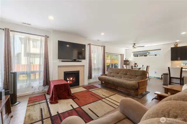 Downstairs family room adjacent to kitchen. Television included with home.