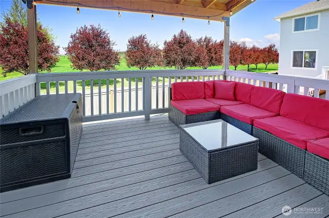 Private, covered outdoor living space looking out to trail & park...