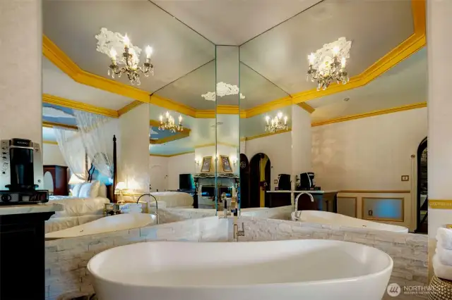 Soak into blissful relaxation in the Palace Suite's freestanding soaking tub with a romantic view of the wood-burning fireplace.