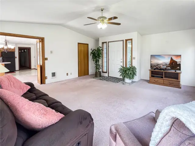 Living room and front entrance.