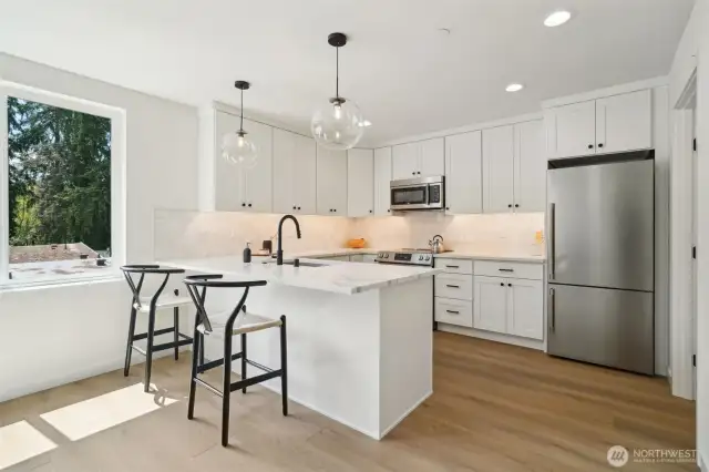 Photos are of staged unit 20311 A. Similar finishes and floorplan