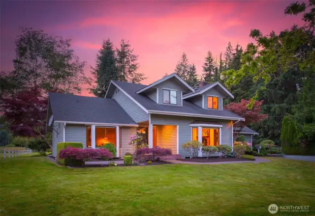 Discover this peaceful retreat in Arlington Heights, set on a beautifully landscaped 2.5-acre lot.