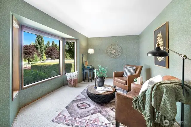 2nd sitting area off the front door, perfect for reading or sipping your morning coffee.