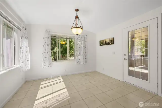Dining nook with entrance to deck