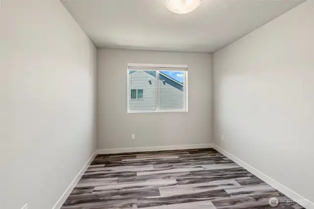2nd Bedroom with Nice Closet Organzier. Room is bigger than appears