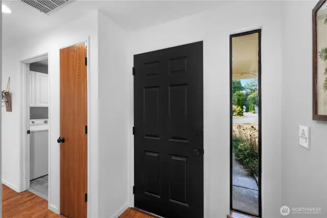 The foyer to greet guests, coat closet to your left.