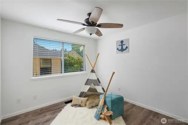 Bedroom 2 with ceiling fan.