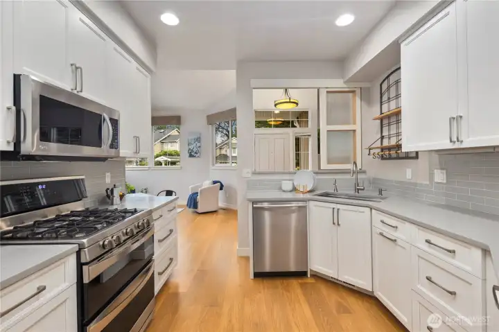 The remodeled kitchen is ready to make all your cooking and baking dreams come true. Glass sliders close to allow privacy if you've made a mess, or open if you want to chat while you cook.
