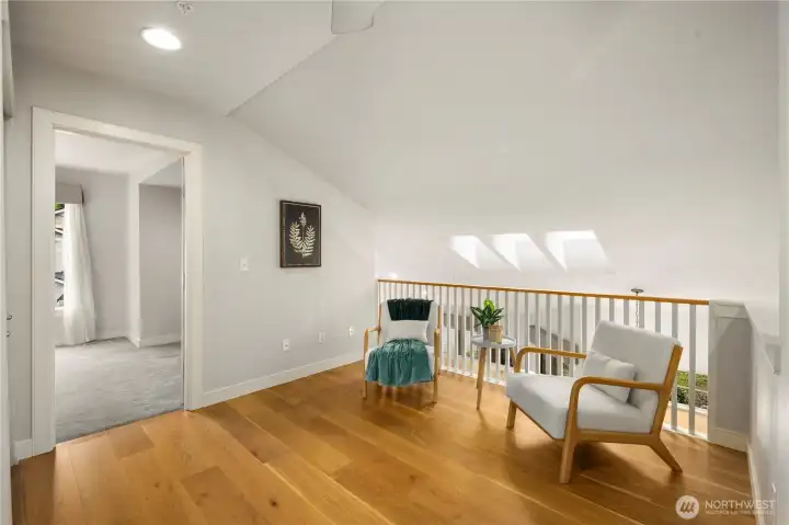 This flexible loft space is the perfect sun-drenched reading nook or work-from-home space.