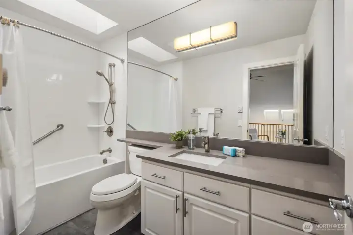 Upstairs full bathroom to be shared by the two upstairs bedrooms. More quartz countertops and beautiful finishes.