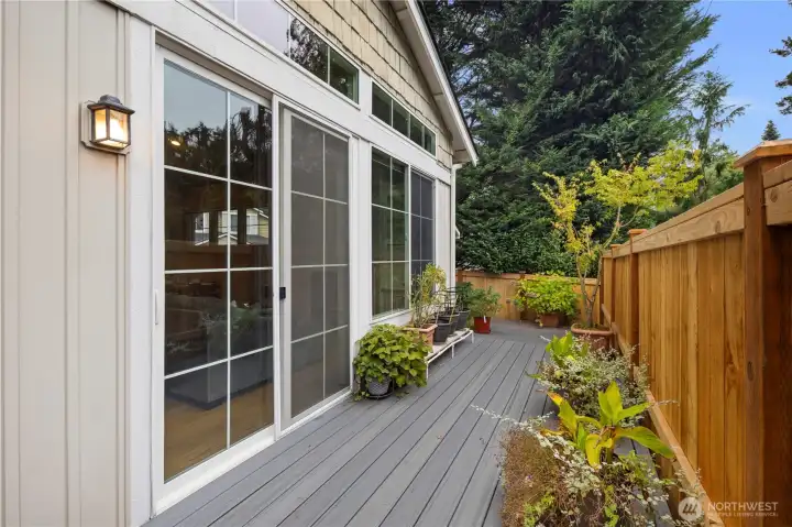 Large sliders and a screen door make indoor/outdoor living easy.