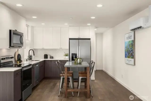 Open concept layout with a spacious kitchen.