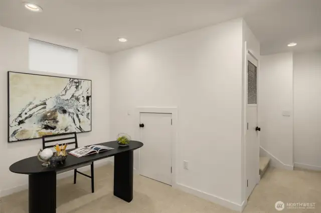 Lower level features a flex space and bedroom with a full bath.
