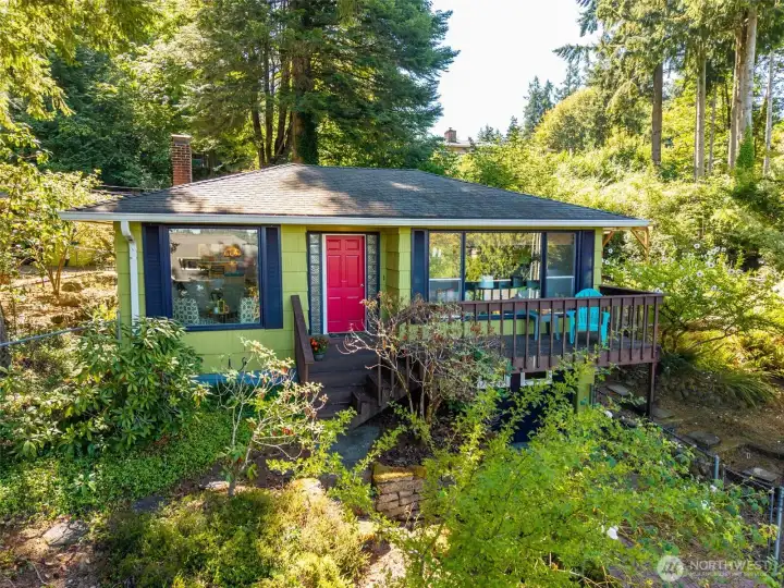 Loads of character abound in this 1945 year built, 1912s/f, 3bdrm/1.75 bath one-story with basement /single car garage and extra hobby/storage area.  all easily accessed from the upper shop/parking area.