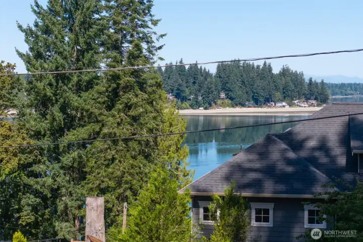 A rough estimate of the view from the deck and a few areas of the living room shows the pride-of-ownership ambiance of Sunrise Beach neighboring properties too. Stroll through adjacent park-like Green Cove area too.