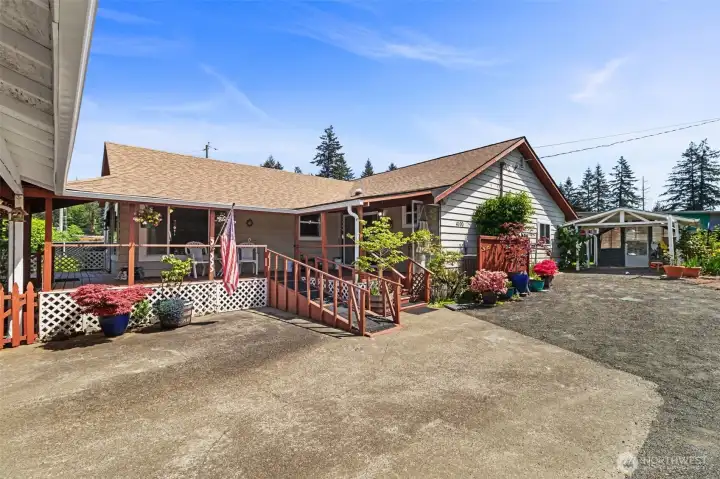 Home with deck and stairs/ramp